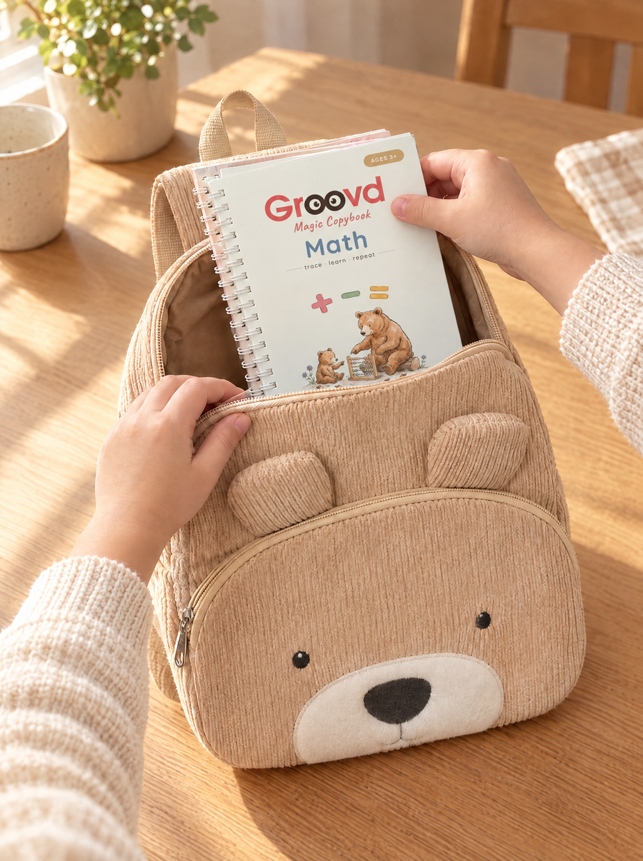 The Groovd magic copybooks going into the Groovd Bear Backpack