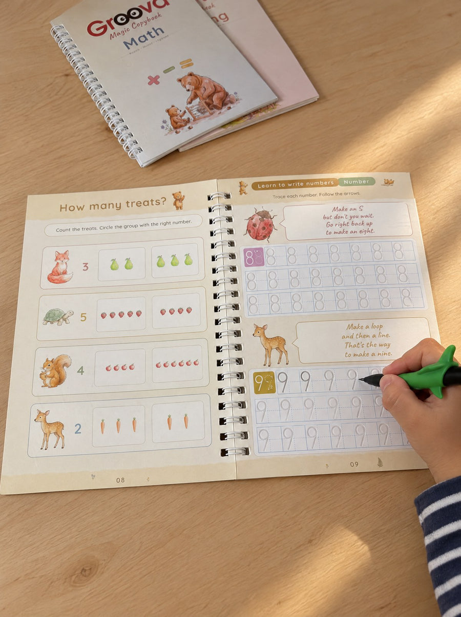 A child traces the grooved number 9 in the Number copybook