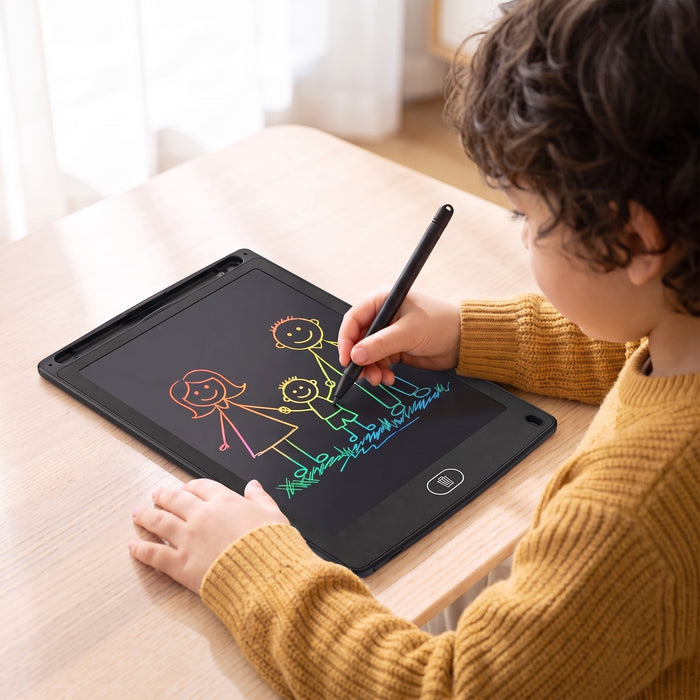 A child uses the black pen to draw three rainbow-colored people holding hands on the tablet, at a wooden table