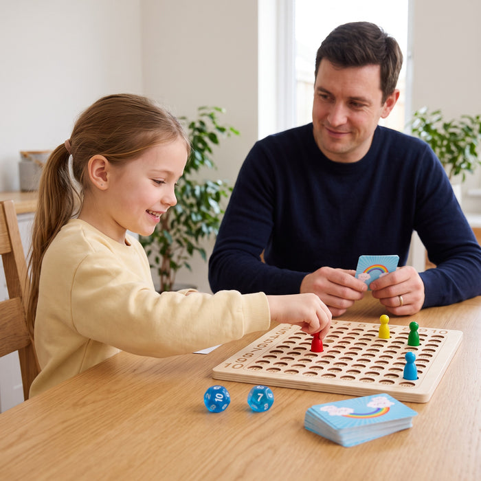 A child playing with the MathMaster Board Game